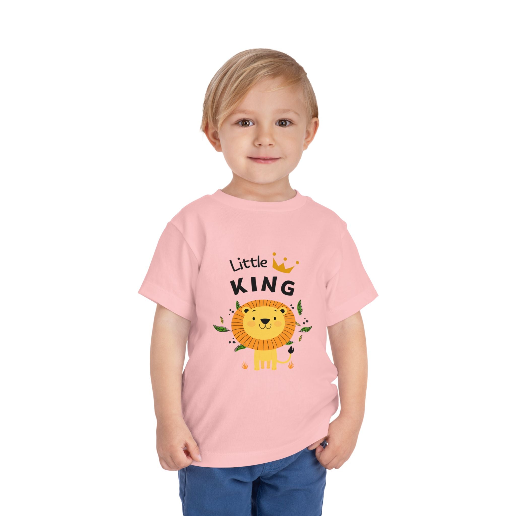 Child wearing a pink t-shirt with a lion graphic and 'Little King' text on a white background