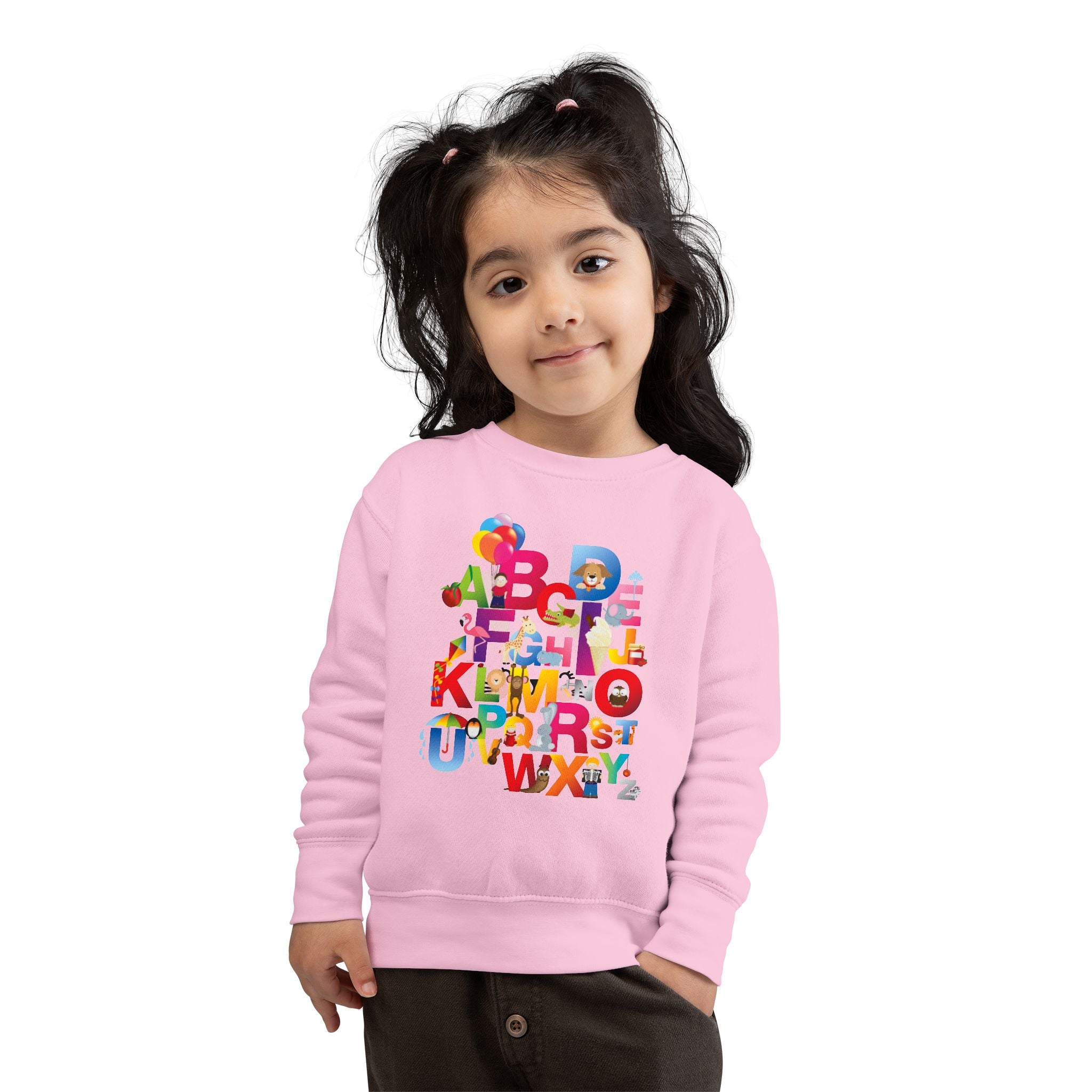 Child wearing a pink sweatshirt with colorful letters on a white background