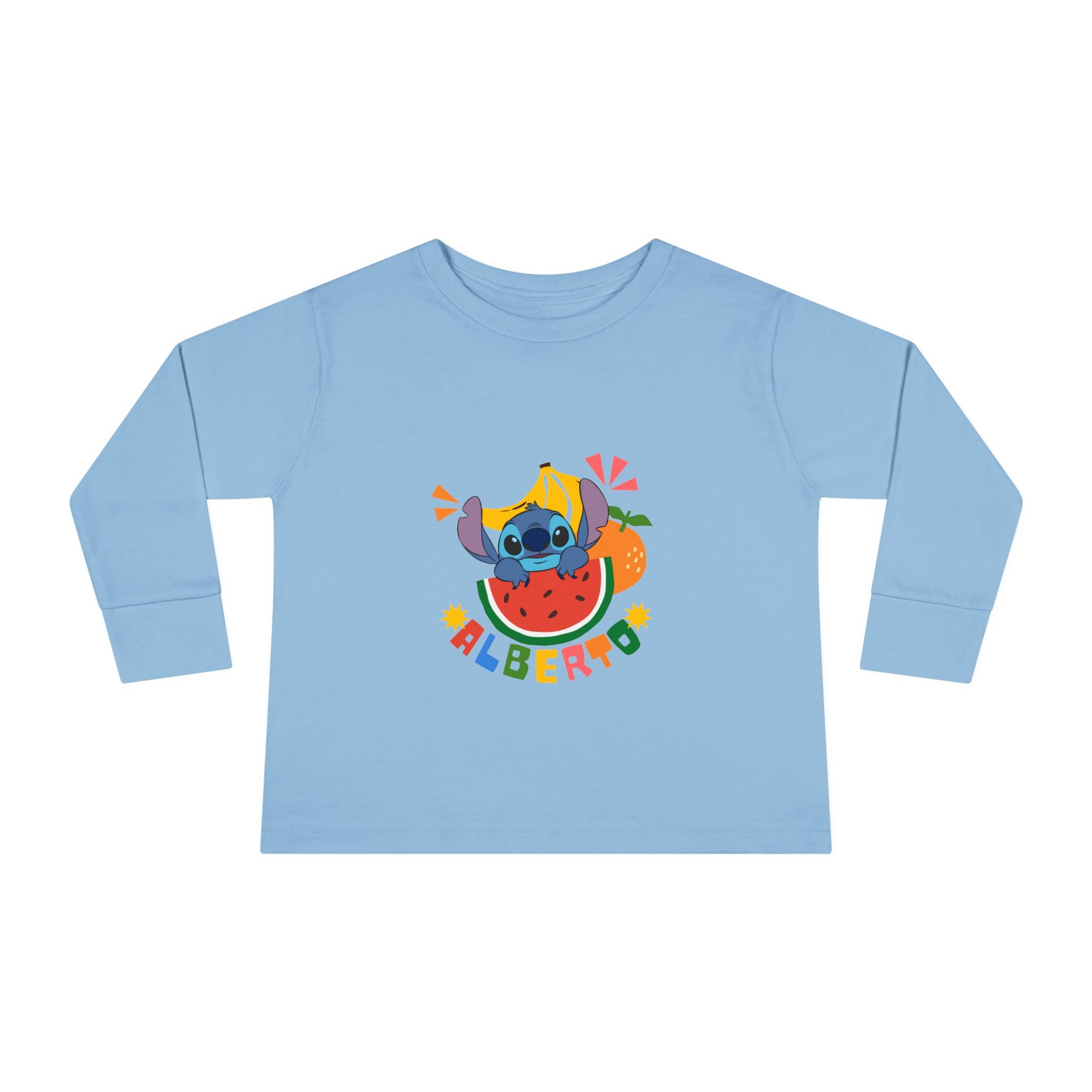 Light blue long-sleeve shirt with cartoon character and 'Alberico' text on a white background