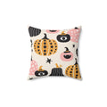 Decorative pillow with Halloween-themed pumpkins and ghosts on a white background