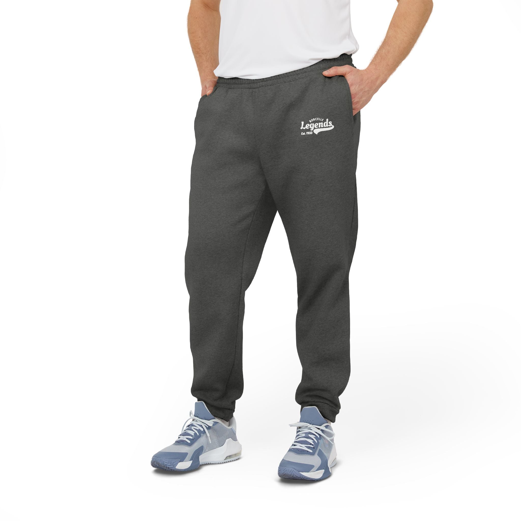 Person wearing dark gray sweatpants with a logo on a white background