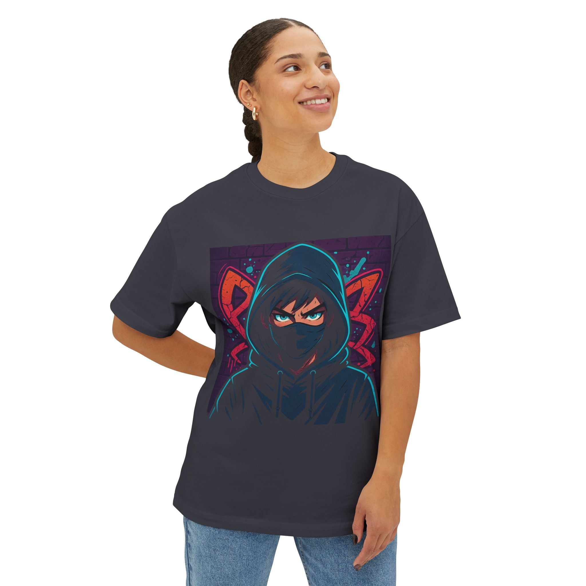 Person wearing a dark gray t-shirt with a colorful graphic design on a white background