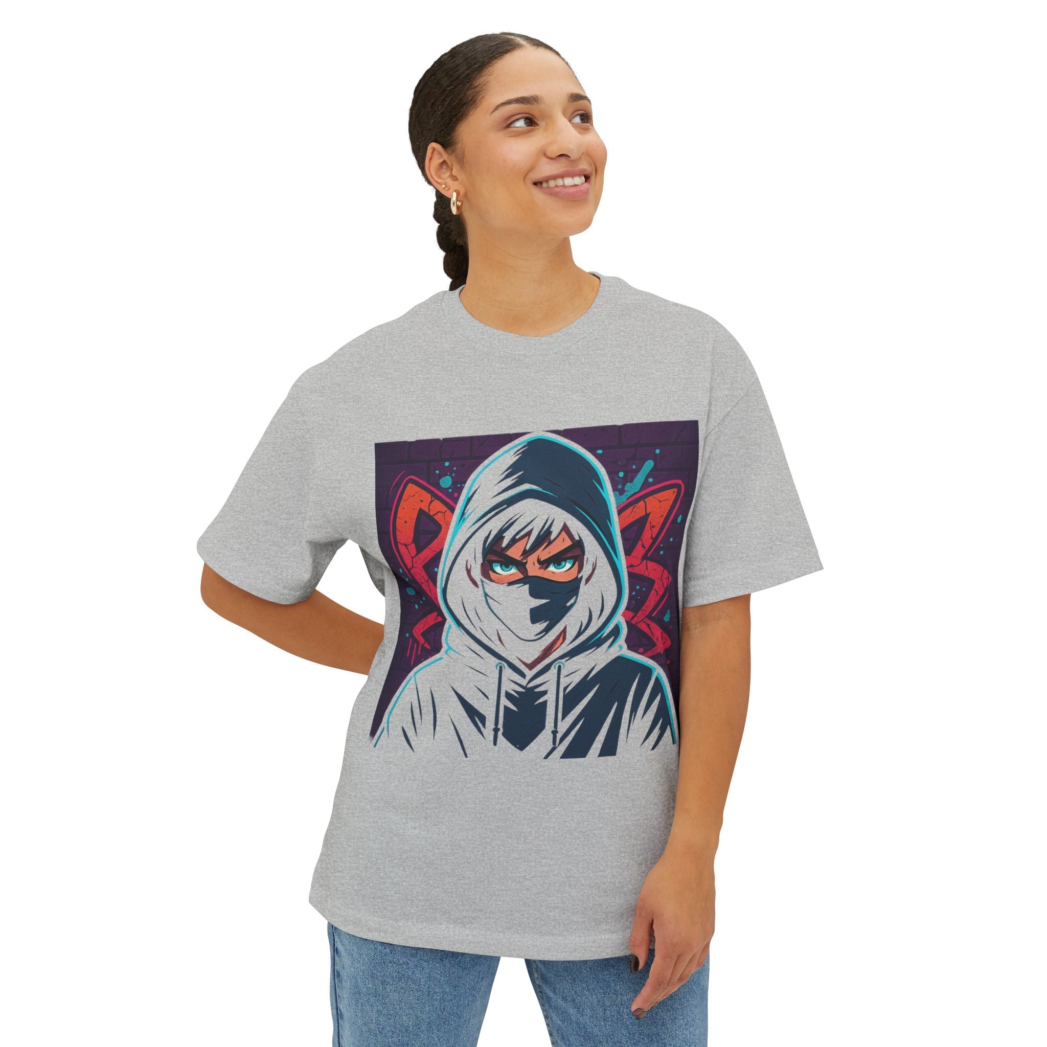 Person wearing a gray t-shirt with a graphic design on a white background