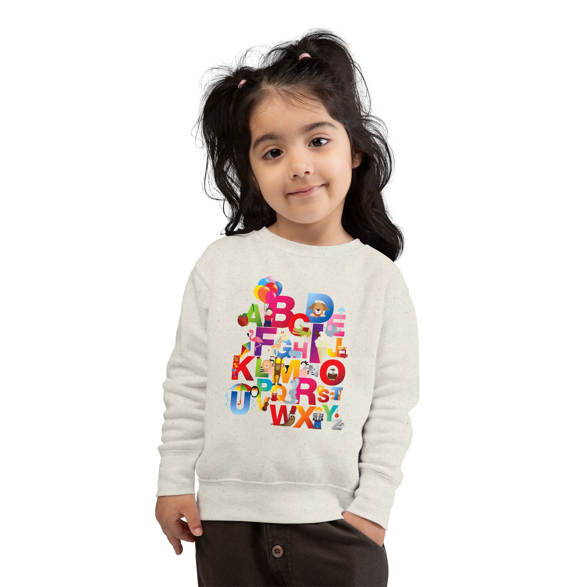 Child wearing a white sweatshirt with colorful letters on a white background